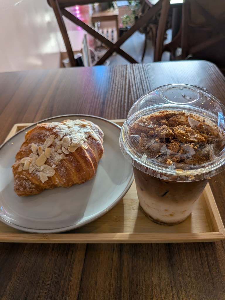 Almond croissant and a Biscoff latte at the First Cup Cafe